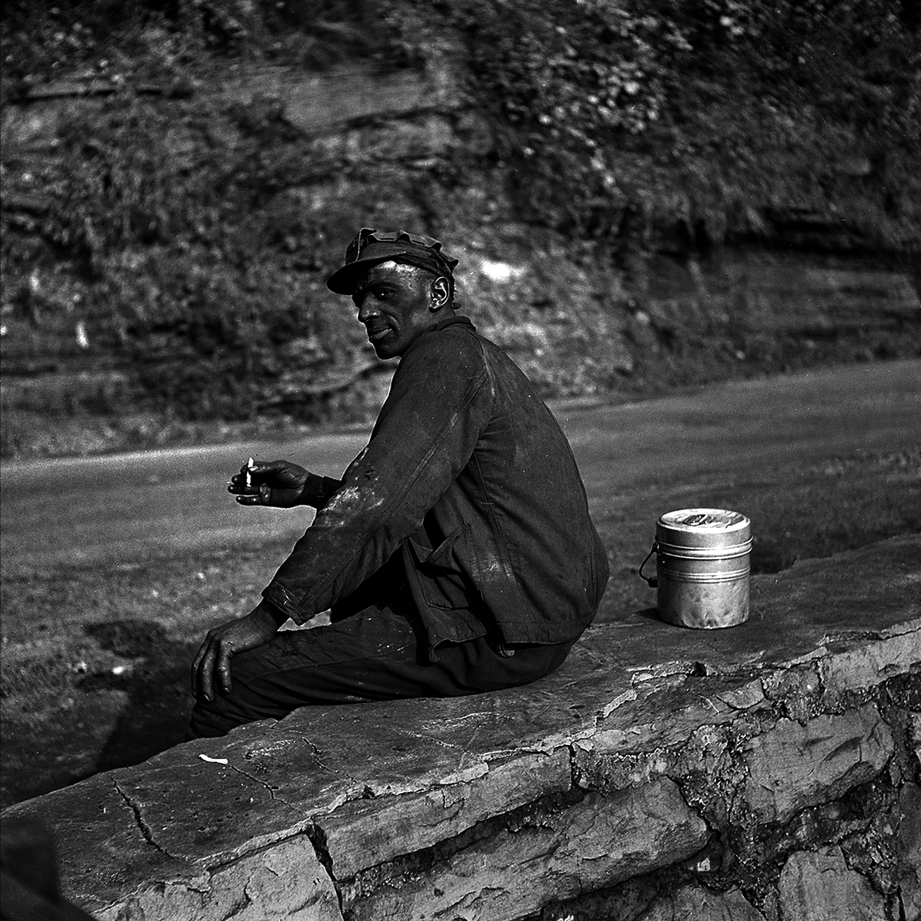 Marion Post Wolcott -September 1938. Capels, West Virginia. Coal miner waiting for lift home - 32 X 32